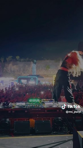 Outdoor DJ Performance at Night: A Lively Event