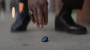 Ripple on Netflix: What is the meaning of the blue stone? Symbolism explained