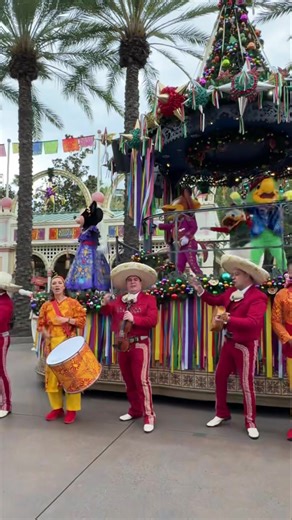 The Disney ¡Viva Navidad! Street Party during Disney Festival of the Holidays at the Disneyland Resort is always such a great time. Mickey and Minnie move by quickly in bicycles before exiting to join the Three Caballeros and a host of other performers. The show plays only on select days (weekends), so check the app! Arrive early, as there are some guests who love it so much that they stay for multiple showings. #vivanavidad #disneyvivanavidad #mickeyandminnie #mickeymouse #minniemouse #threecab