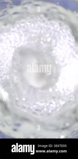 Super slow motion, Macro Water Vortex Splash High Speed, Bubble Ring Forming Stock Video Footage - Alamy
