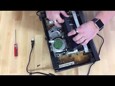 Help! My VHS Player Ate My Tape: Time lapse of Breaking Into a VCR and Removing a Tape Without Harm