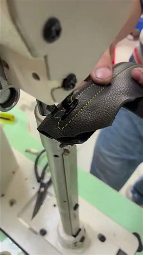 Sewing leather material using a machine to create strong stitches #popular #machine #skills #work