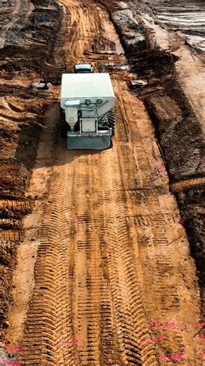 First step in the stabilization process is underway on our Forest Edge job site. Using the site spreader to lay cement before mixing and compaction. 👏 . . . construction | charleston | heavy equipment | Sanders Brothers Construction