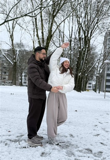 Couple Dancing in the Snow: Joyful Winter Moments