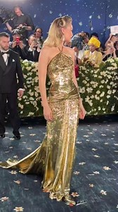 Gigi Hadid wears gold dress to Met Gala