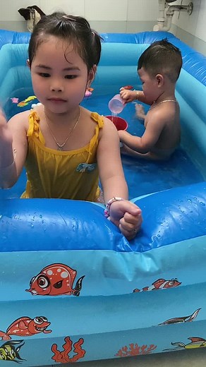Kids Enjoy a Fun Day in an Inflatable Pool