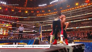 1.7M views · 849 reactions | Cody Rhodes sends Roman Reigns through the announce table!!! #WrestleMania | WWE Network | Facebook
