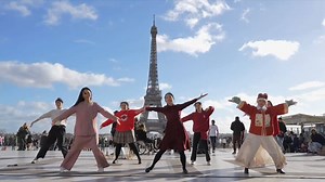 7.6K views · 571 reactions | Several Chinese students staged a flash mob dance in front of the iconic Eiffel Tower in Paris. #ChineseNewYear | China Xinhua News | Facebook