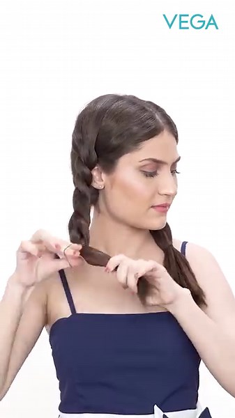 VEGA | At-Home Styling Experts on Instagram: "Double the Braids, Double the Fun! Learn how to create this stunning double-sided braided ponytail in minutes. Easy DIY hairstyles at home #StartsWithVega."