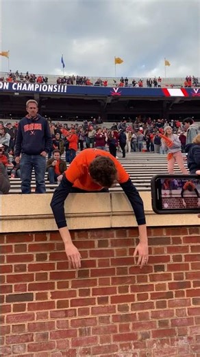 Sad Virginia Fan puts a happy twist on an old pose