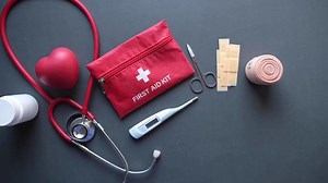 First aid kit supplies on tabletop