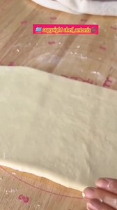 Fluffy Milk Bread 🥰 dough preparation in the mixer bowl bread flour 250g powdered milk 7g sugar 22g salt 3g stir well milk 180ml instant dry yeast 5g knead the dough for 5min add butter 22g knead the dough for 7min cover the dough rest the dough for 60min separate the dough Into two pieces make balls cover the dough rest the dough for 20min make the bread roll the dough rest the dough for 40min sprinkle flour on the top cut the bread on the top 5 times Bake in a preheated oven 180C 22 to 25min 