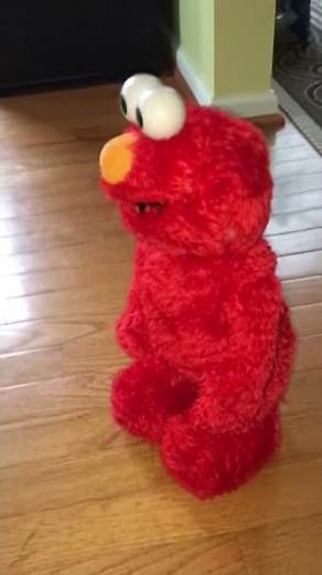 Possessed Elmo scares baby.... not so 'tickle me'