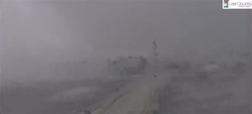 Video of a rain-wrapped tornado pushing onshore captured on the Matlacha Bridge facing west in Matlacha, FL. North of Sanibel. Camera by Lee County | Florida's Weather