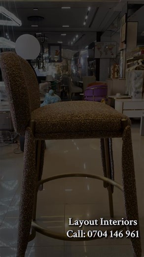 This modern Island chair has a boucle fabric and sturdy metal legs is designed for comfort. #interiordecor #layoutinteriors #interiordesign #creatorsearchinsights #fypp