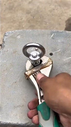 Testing the tensile strength of anchor bolts embedded in concrete, to see how strong the bolts are