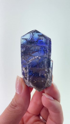 27K views · 1.5K reactions | Tanzanite is one of our favorite gemstones. It just has such unique properties compared to everything else. And somehow the change of colors combined with the shape and the patterning makes them stand out dramatically from all other gem crystals. This is a natural, unheated, beautifully colored tanzanite. #tanzanite #zoisite #gemcrystals #uncutgems #gemsandminerals | The Arkenstone Gallery of Fine Minerals | Facebook