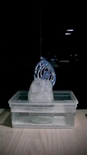 Porcelain Eye Revealed as Ice Melts — Slow Emergence