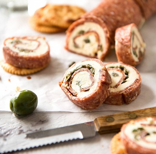 A great inexpensive party food to make for a crowd! https://www.recipetineats.com/salami-cream-cheese-roll-ups/ | RecipeTin