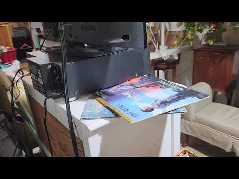 Pioneer DVD LD player model dvl919Comes with 5 laserdisc movies of your choice! $100