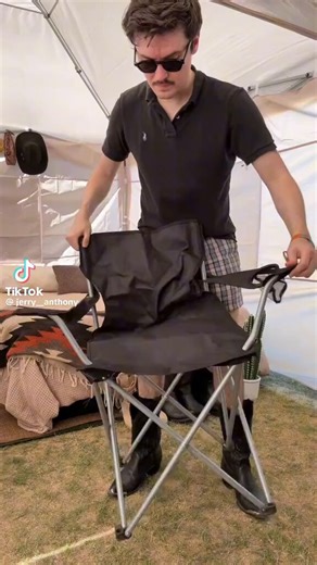 Bad design. He should be floating the couch off the wall to create the depth and shadow he needs for an intimate setting. He's emphasizing the dead space. Also, all the decor is on the same horizontal plane, no verticality to pull the eye up. This feels like a waiting room.