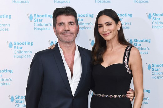 How Simon Cowell's Fiancée Lauren Silverman Helps Him Relax: "He's a Workaholic"