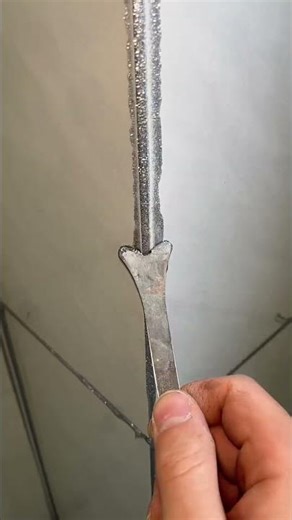 Compaction of grout at the corners of the wall #shorts