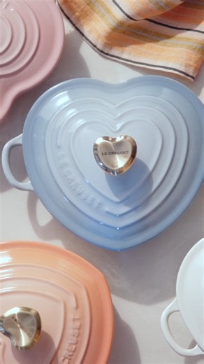 Cookware with heart. 🩷 Lovingly crafted from our legendary cast iron, the Shallow Heart Cocotte has exceptional heat distribution and retention qualities to lock in flavor, and large loop handles designed for easy lifting from oven to table. Shop: https://bit.ly/3iJ4hud | Le Creuset