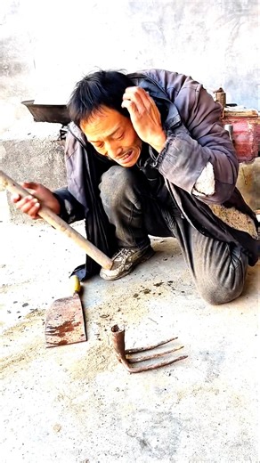 A Man Repeatedly Fails While Fixing a Metal Tool #