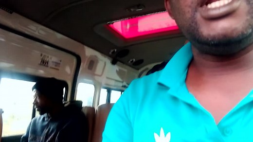 Inside a Bus: Passengers in a Colorful Setting