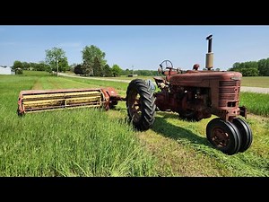 Mowing grass hay with 1948 farmall M and new holland 489 haybine