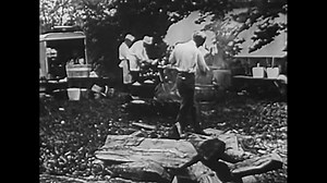 USA - 1920s - Henry Ford and friends take to the roads to go camping, Thomas Edison and others relax in the forest.