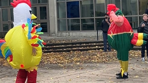 Friends in chicken costumes create a hilarious lunchtime scene with an unexpected fight