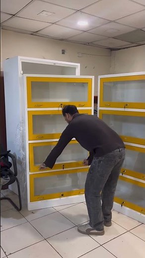 4-Shelf Modern Book Rack with Lockable Glass Doors. Made up of Complete Metal .