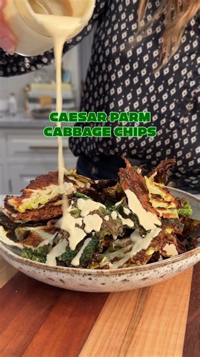 Low-Carb, High-Fiber Caesar Parm Cabbage Chips! 🥬💚 Add this salty, crunchy, and healthy snack to your rotation! Your new favorite guilt-free snack! Cabbage Chip Ingredients: • 1 Savoy cabbage head • 2 tbsp avocado oil • 1 tsp salt • Pepper to taste • 3 tbsp Parmigiano Reggiano, finely grated Garnish Ingredients: • Grated Parmigiano Instructions: 🥬 Preheat oven to 350°F 🥬 Separate the cabbage leaves and remove the thick veins that run down the center of the bigger leaves 🥬 Rinse the leaves u