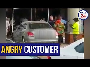 WATCH: Angry customer rams car into Standard Bank branch