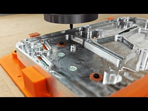 CNC machining a Svalboard base using 3d printed fixture plates.