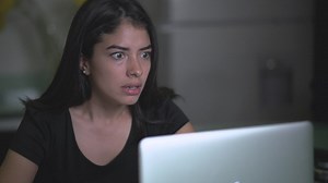 Young very frustrated woman in front of her computer - Free Stock Video