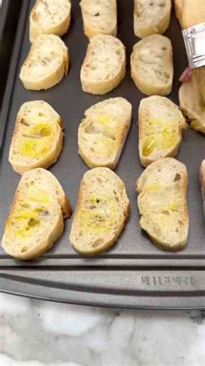 Easy French bread appetizer with pesto and ricotta