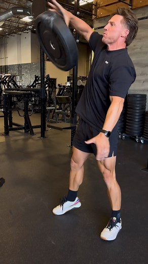 Steve Cook | 45lb bumper plate flip challenge! Grip strength and big hands are important! | Instagram