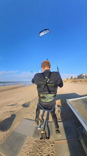 Adventurous Kiteboarding Parkour on the Beach