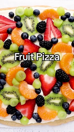 This easy fruit pizza will seriously impress your family and friends! 😍 With an irresistible homemade sugar cookie crust, cream cheese frosting and a variety of fruit, this family favorite fruit pizza won’t last long once you try the first bite 😋 #blogger #food #foodblogger #dessert #michiganblogger #bakery #bakinggoals #ohmyyum #recipes #recipe #recipedeveloper #easyrecipe #fruit #fruitpizza #sugarcookie #cookierecipe