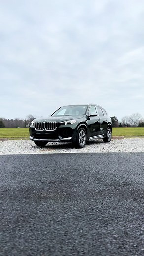 2024 BMW X1 in San Remo Green Metallic with Oyster Perforated Veganza Interior