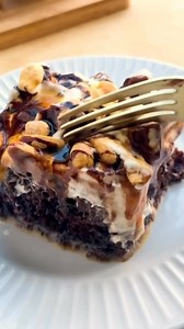 6.6K views · 43 reactions | This Snickers Poke Cake is next-level...