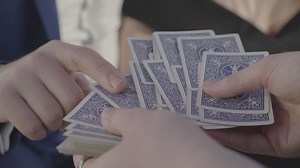 Magician hands demonstrate card trick illusion - Free Stock Video