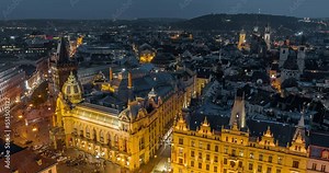 Prague Czechia Aerial v37 night hyperlapse birds eye view flyover bustling old town square capturing illuminated downtown cityscape featuring historic buildings - Shot with Mavic 3 Cine - October 2022