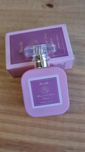 This is the Strawberry Candy perfume 1 got from the TikTok shop. It smells so good, like real strawberry candy, and it lasts all day. I even got stopped multiple times today by people asking, 'What are you wearing?' Not only does it smell amazing, but it's also super fancy with this bink and white look. It's giving girly vibes, and y'all need this! #fragrance #fragrances #bellavitaperfumes #womenperfume #designerfragrance