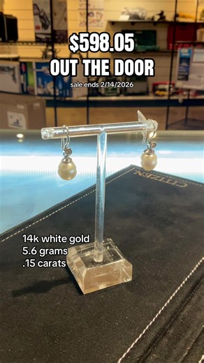 Diamond and stone earrings in 14k white gold. Weighs 5.6 grams and features 2 diamonds at .15 carats and two white pearl-like stones. Regular $899.99 but on sale for 40% off until 2/14/2026! That’s only $598.05 out the door! #oakland #bayarea #diamondearrings #pearls #pawnshop