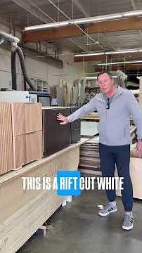 Fluted White Oak Cabinets With a Hidden Outlet Drawer