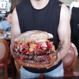 440K views · 878 reactions | This GINORMOUS & MASSIVE burger is called Belly of the BEAST!  | Foodbeast | Facebook